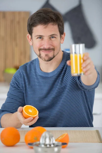 Happy Man Holding Freshly Squashed Juice — Stock Photo, Image
