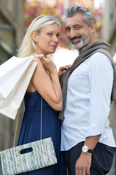 Senior Couple Taking City Break Going Shopping — Stock Photo, Image