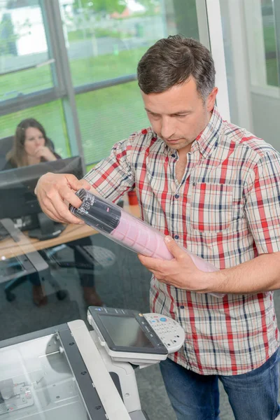 Man Photocopier Holding Package — Stock Photo, Image