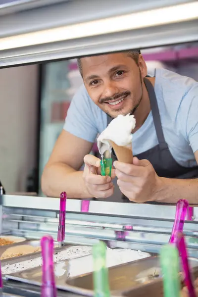 confectioner selling ice cream in the store