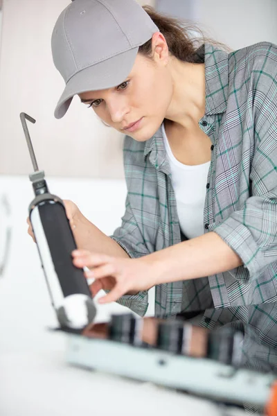 Woman Installing Induction Hobs Kitchen — Stock Photo, Image