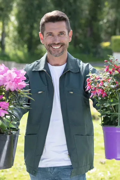 Happy Gardener Holding Flowers — Stock Photo, Image