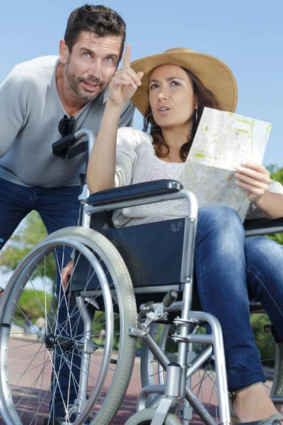 Couple Map Finding Way Woman Wheelchair — Stock Photo, Image