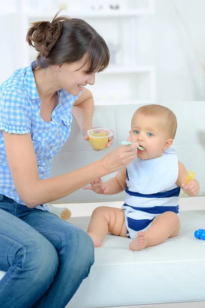 Young Mother Feeding Her Baby — Stock Photo, Image