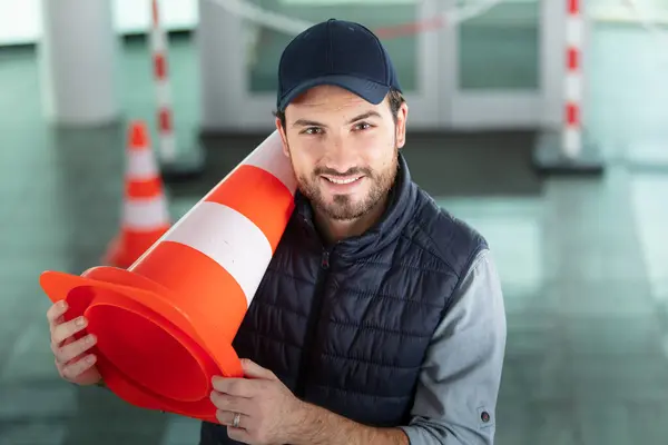 Workman Holding Traffic Cone — Stock Photo, Image