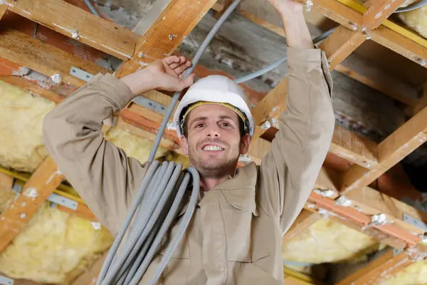 Man Installing Cable Ducting Renovation Property — Stock Photo, Image