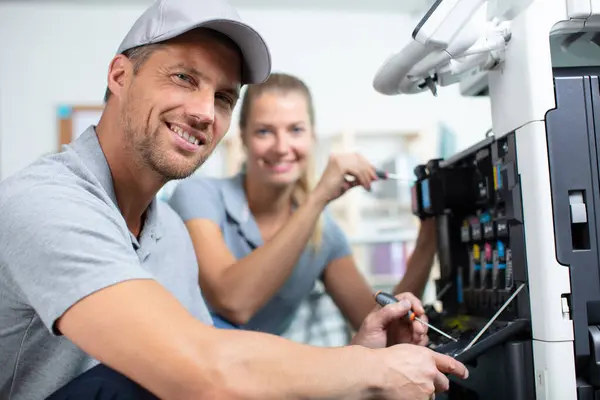 Young Beautiful Woman Assistant Fixing Printer — Stock Photo, Image