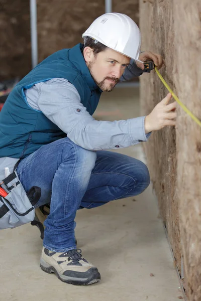 Builder Measures Distance Wall Tape — Stock Photo, Image