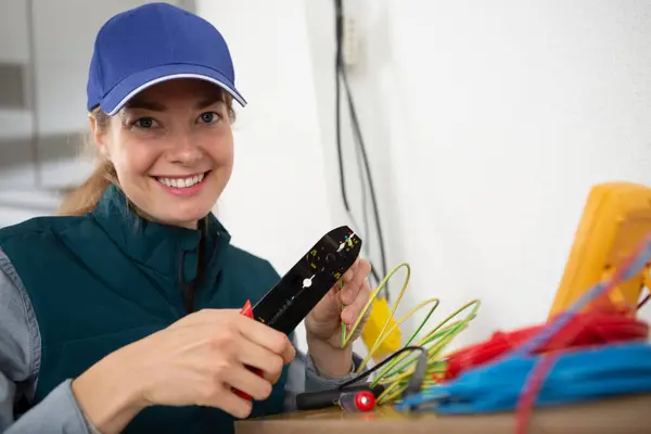 Woman Cutting Wire Special Tool — Stock Photo, Image