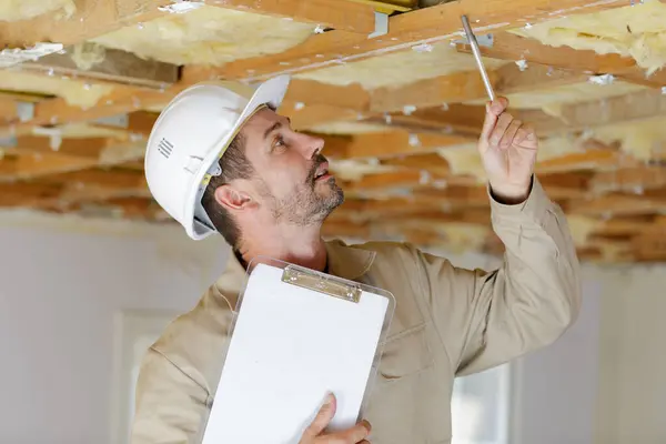 Builder Inspector Looking Wooden Ceiling Struts — Stock Photo, Image