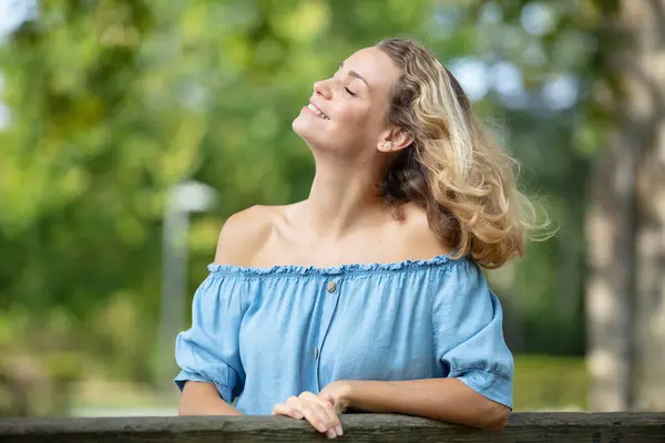 Woman Outdoors Enjoys Breeze Her Face — Stock Photo, Image
