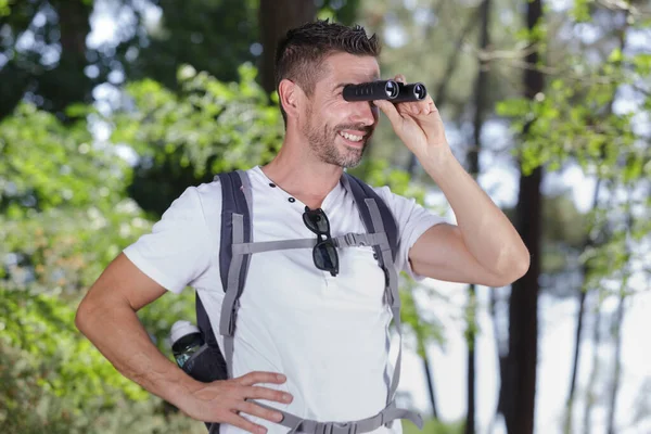 Man Binoculars Standing Woods — Stockfoto