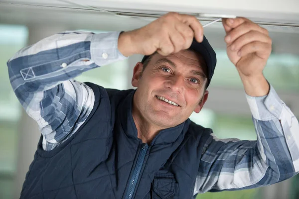Workman Fitting Spotlight Ceiling — Stock Photo, Image