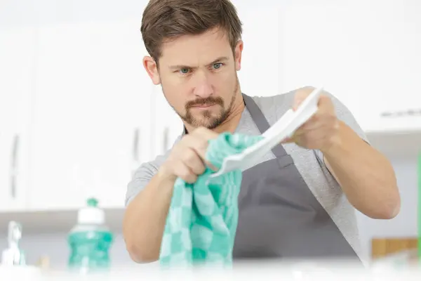Young Man Drying Polishing Dish Towel — Stock Photo, Image