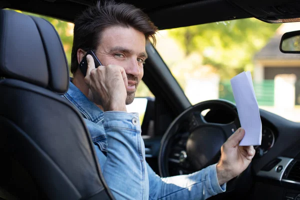 Handsome Young Man Using Mobile Phone While Driving Car — Stock Photo, Image