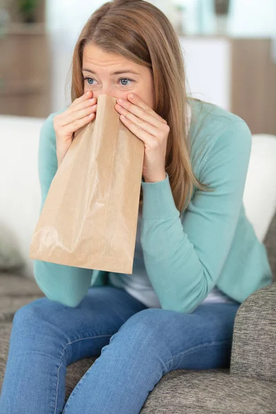 Young Woman Breathing Paper Bag — Stock Photo, Image