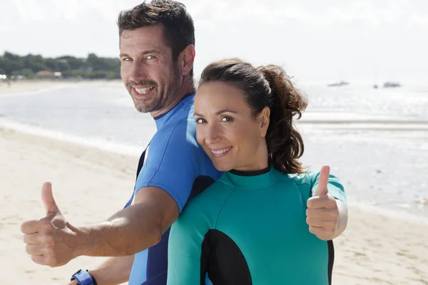 Surfers Beach Showing Thumbs — Stock Photo, Image