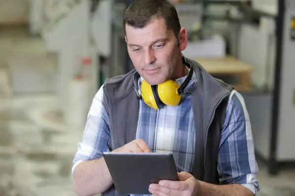 Standing Worker Holding Digital Tablet Warehouse — Stock Photo, Image