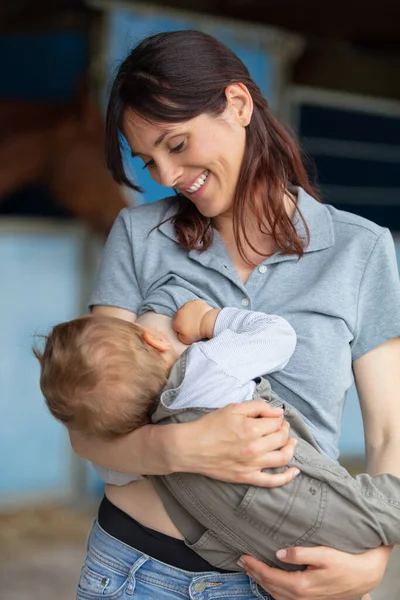 Young Mother Brestfeeding Boy Outdoors — Stock Photo, Image