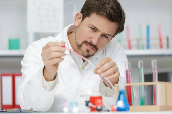 chemist man in medical science laboratory