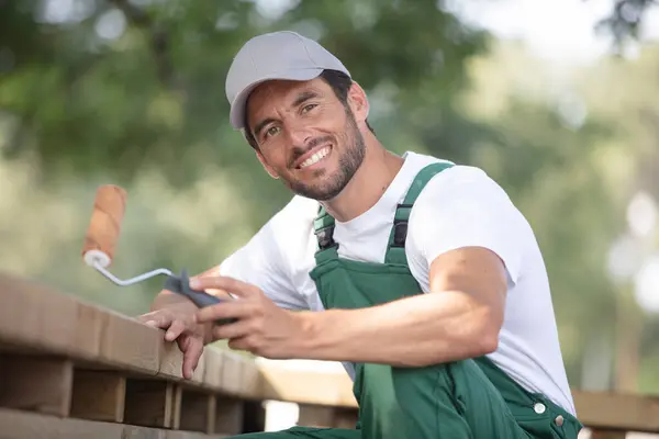 Happy Man Paint Furniture Outdoors — Stock Photo, Image