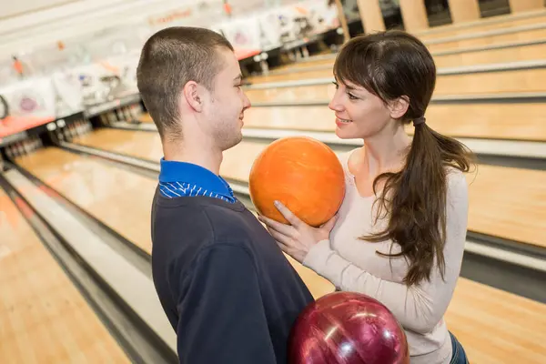 dating couple enjoy bowling together