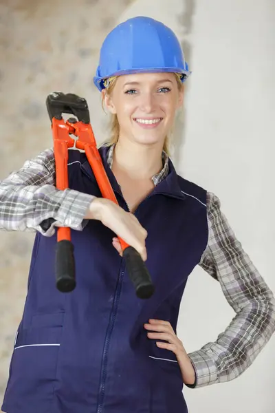Female Builder Happily Holding Shears — Stock Photo, Image