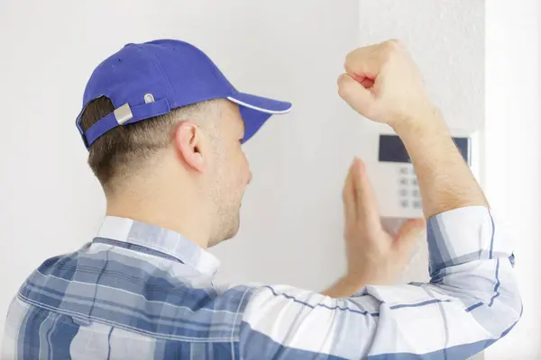 Close Male Electrician Installing Security System Door — Stock Photo, Image
