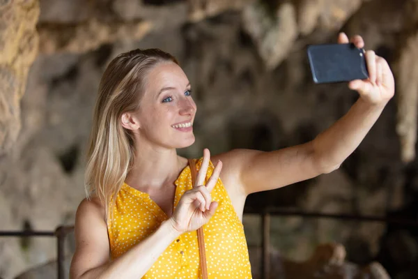 Tourist Woman Taking Pictures Volcanic Rocks Caves — Stock Photo, Image