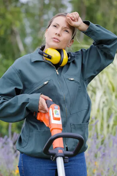 Woman Tired Using Strimmer Garden — Stock Photo, Image