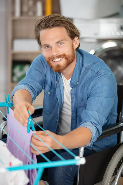 Disabled Man Wheelchair Doing Pegging Laundry Airer — Stock Photo, Image