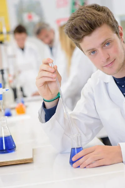 Young Scientist Holding Pipette Glass Flask — Stock Photo, Image