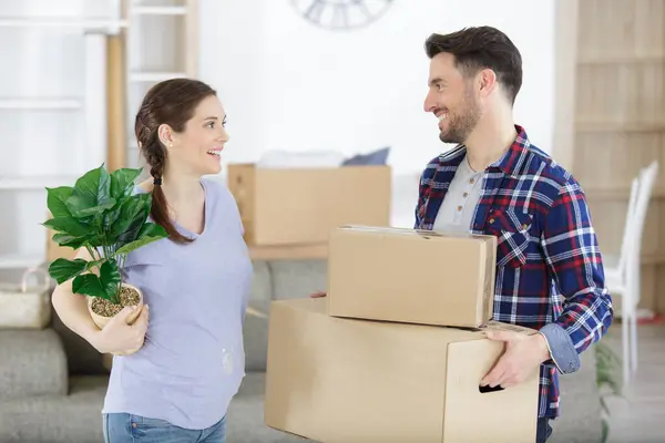 Optimistic Pregnant Couple Holding Cardboard Boxes — Stock Photo, Image