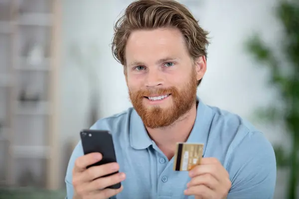 Handsome Smiling Man Credit Card — Stock Photo, Image
