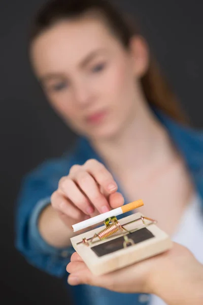 Young Woman Trying Get Cigarette Mouse Trap — Stock Photo, Image