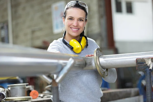 Woman Fixing Pipes Factory — Stock Photo, Image