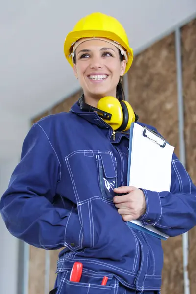 Cheerful Female Construction Worker Holding Clipboard — Stock Photo, Image