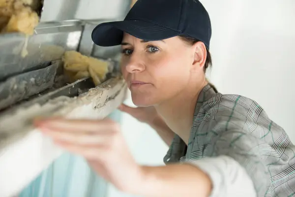 Female Engineer Builder Looking Window Seal — Stock Photo, Image