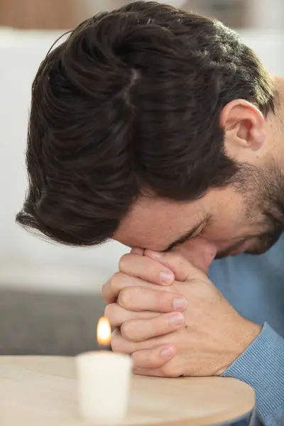 Middle Aged Man Praying Lit Candle — Stock Photo, Image