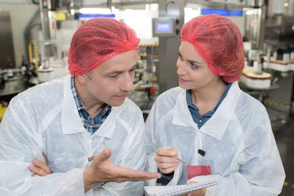 Female Worker Showing Clipboard Colleague Factory — Stock Photo, Image