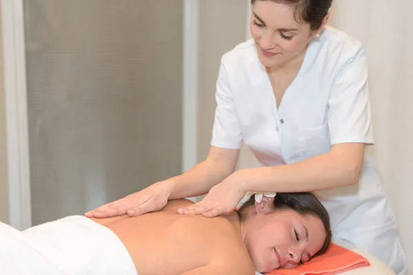 young woman at spa massage
