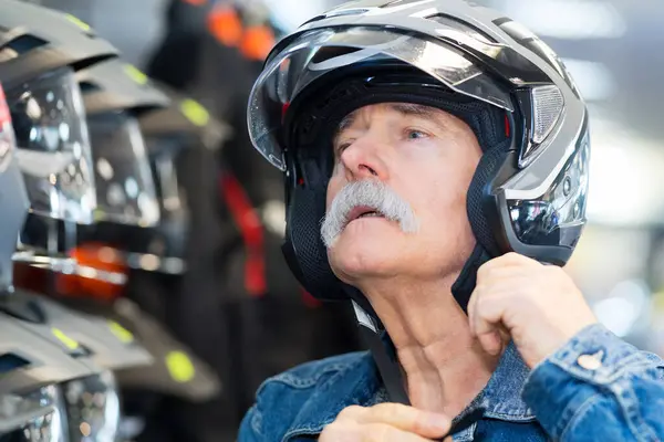 Senior Man Trying Crash Helmet — Stock Photo, Image