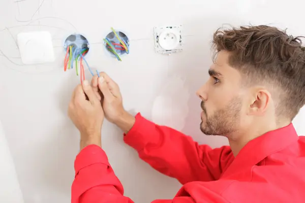 Electrician Technician Fixes Cables Site — Stock Photo, Image