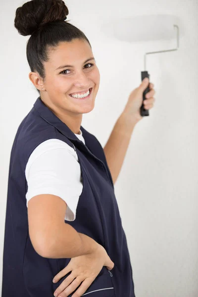 Young Smiling Woman Holding Paint Roller — Stock Photo, Image