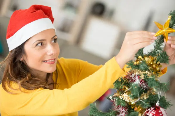 Happy Woman Decorating Christmas Tree — Stock Photo, Image