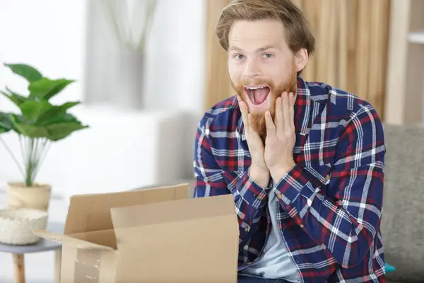 Surprised Man Opening Carton Box — Stock Photo, Image