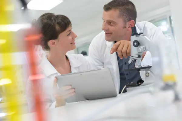 Colleagues Looking Digital Tablet Science Laboratory — Stock Photo, Image