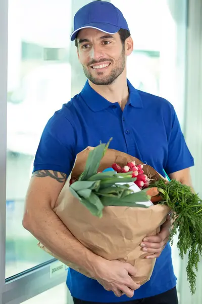 Delivery Man Carrying Groceries Paper Bag — Stock Photo, Image