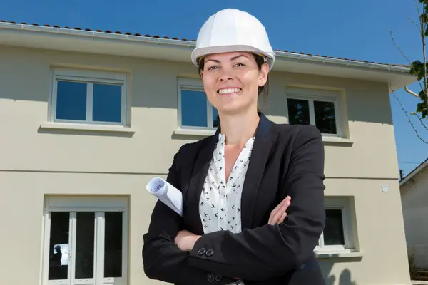 female real estate developer posing