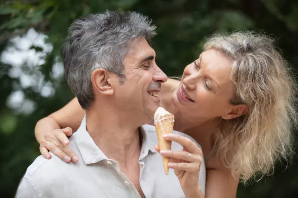 Mature Couple Enjoying Ice Cream Together — Stock Photo, Image